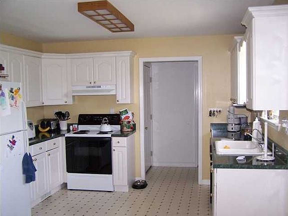 Spacious kitchen with lots of counter space.