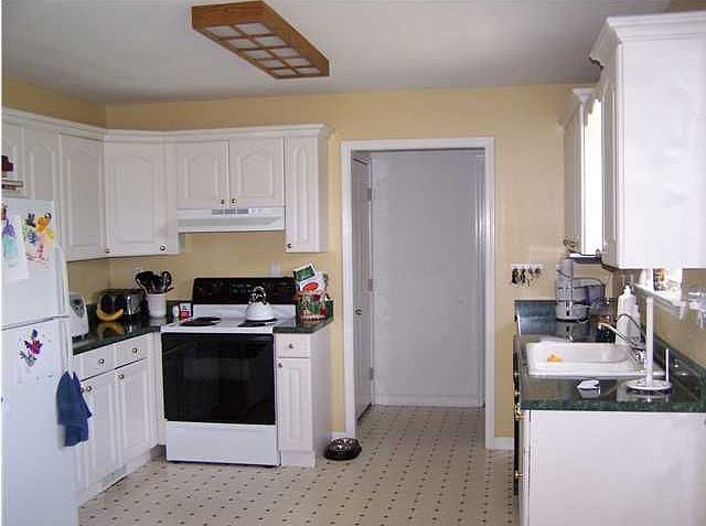 Spacious kitchen with lots of counter space.
