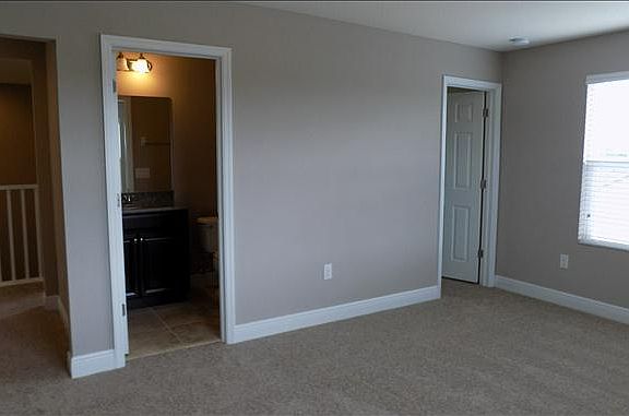 Bonus room includes full bath and storage