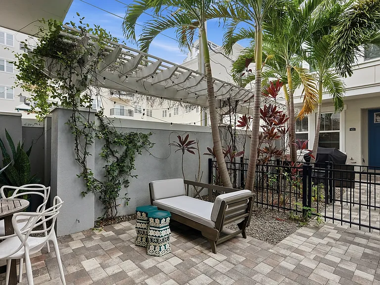 Private courtyard on the end perfect for relaxing, entertaining, gardening, and hanging out with your pets!