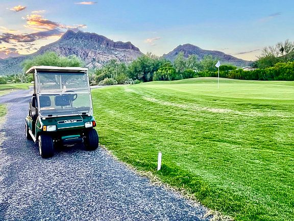 The beautiful mountain backdrop 12th hole at the private Tucson Estates Golf Course (plus the Club Car Golf Cart that will be yours to use with the rental).