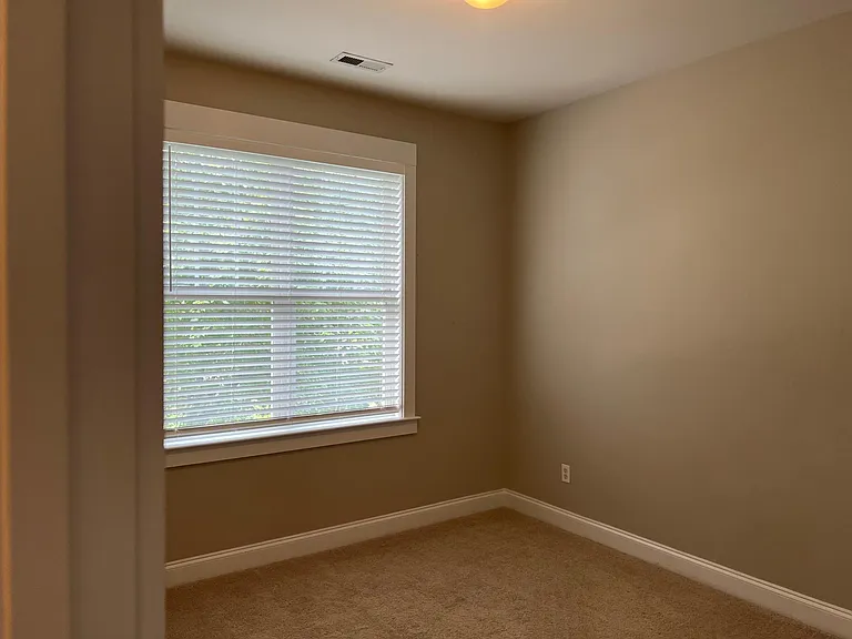 One of the extra bedrooms upstairs. Now has Luxury Vinyl Plank all upstairs.