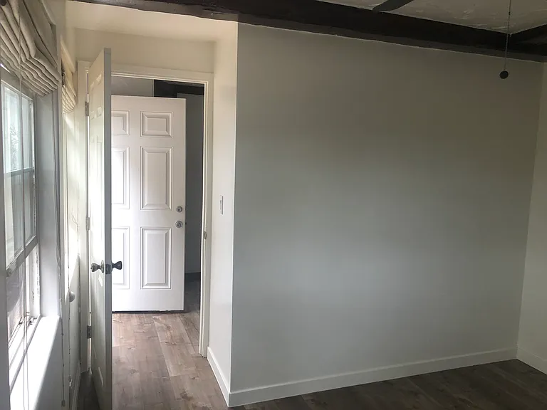 View from bedroom to home entrance