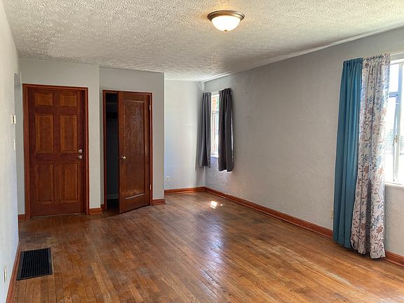 living room, coat closet, interior entrance