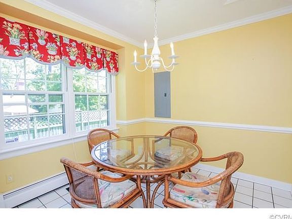 Breakfast room off of the kitchen with custom built in pantry.
