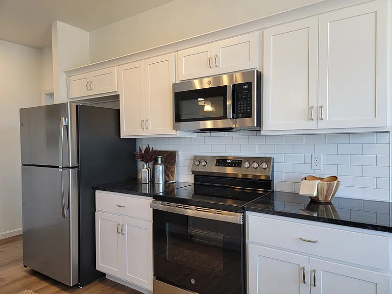 Legacy Floor Plan - Kitchen with Stainless Steel Appliances and Granite Countertops