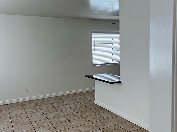 view from 2nd bedroom looking a living room