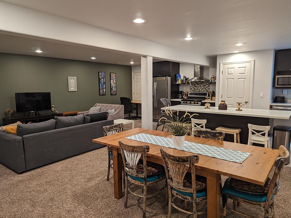 Open concept space with easy flow between the kitchen, living room and dining room.