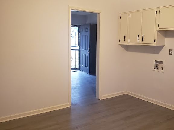 This is a view from inside the kitchen of the kitchen entrance from the living room.