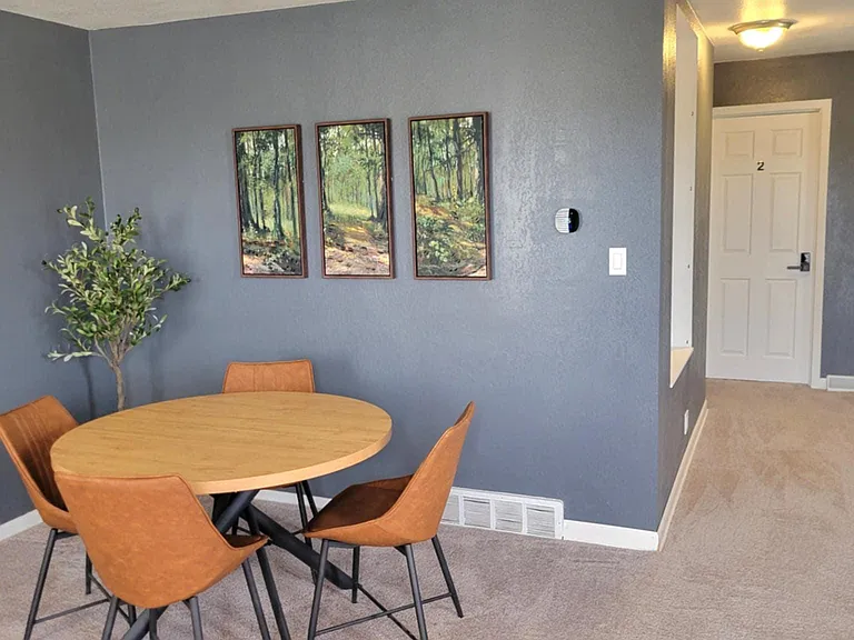 Dining area and hallway to kitchen.