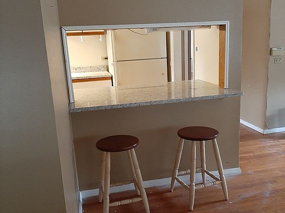 pass thru from living space to kitchen. 
Granite counters