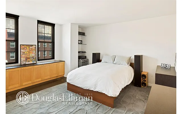 Sold by Douglas Elliman | media 13