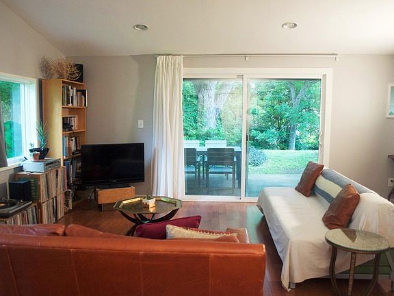 Living Room looking out to Huge Yard and Back Patio