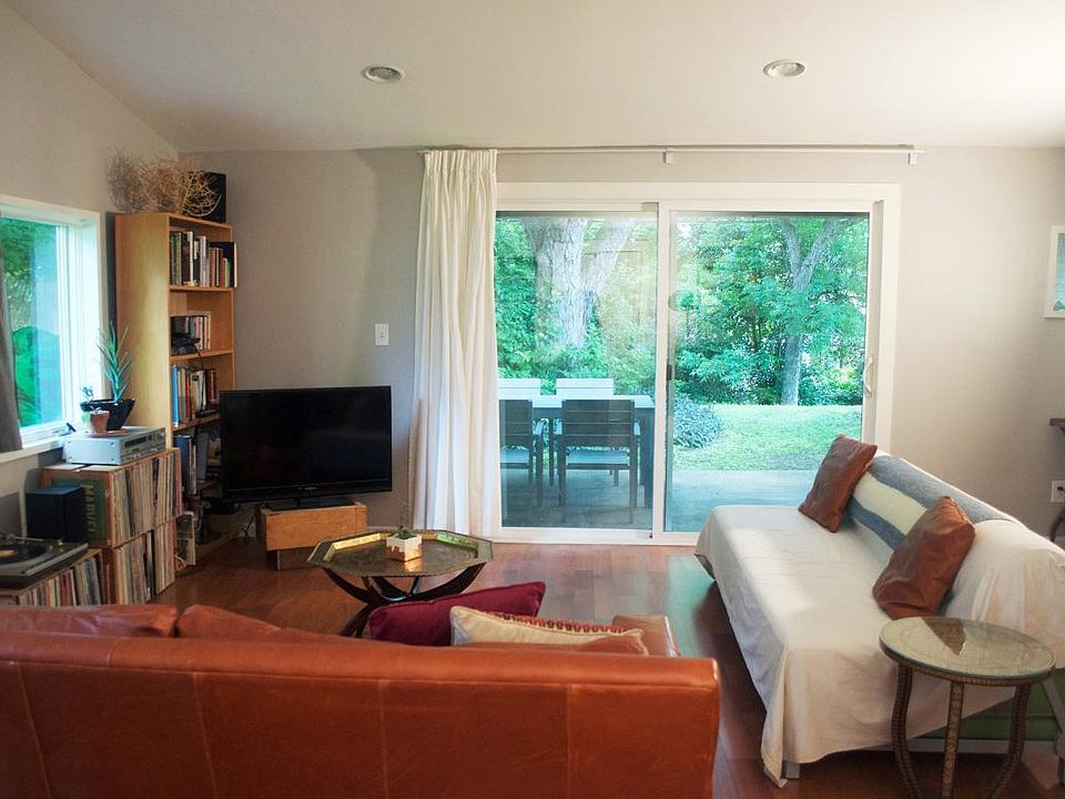 Living Room looking out to Huge Yard and Back Patio