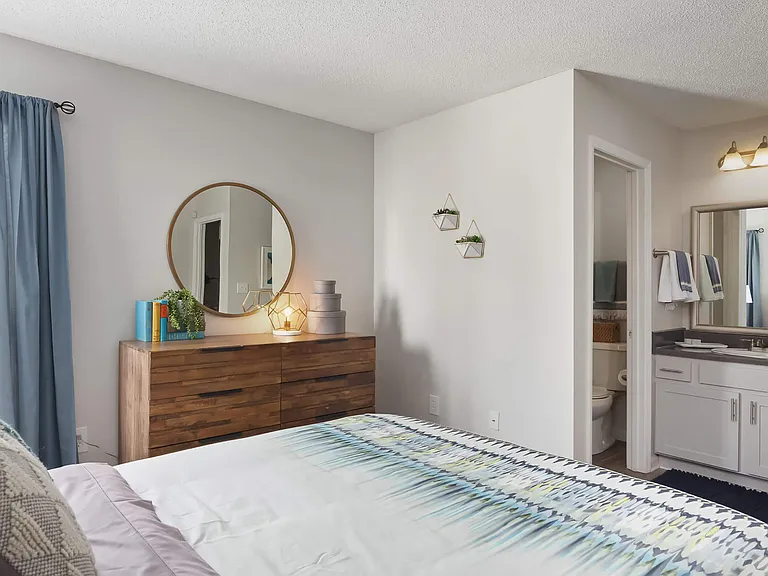 Bedroom with En-Suite Bathroom and Elegant Vanity Area - Diamond Interior