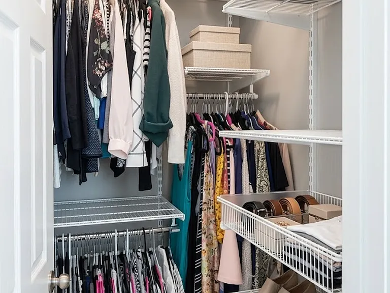 Primary Closed with Container Store designed closet system.