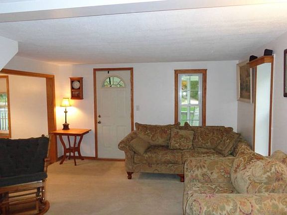 Living room open to the dining area.