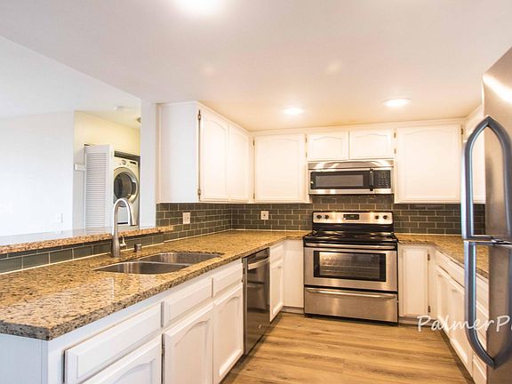 Kitchen with washer/dryer