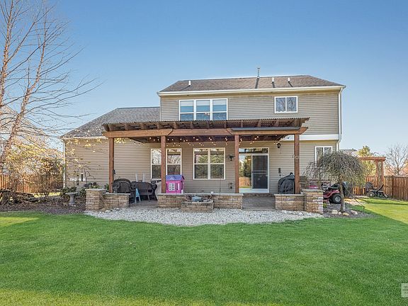Beautiful Covered Pergola and Stamped Concrete Patio