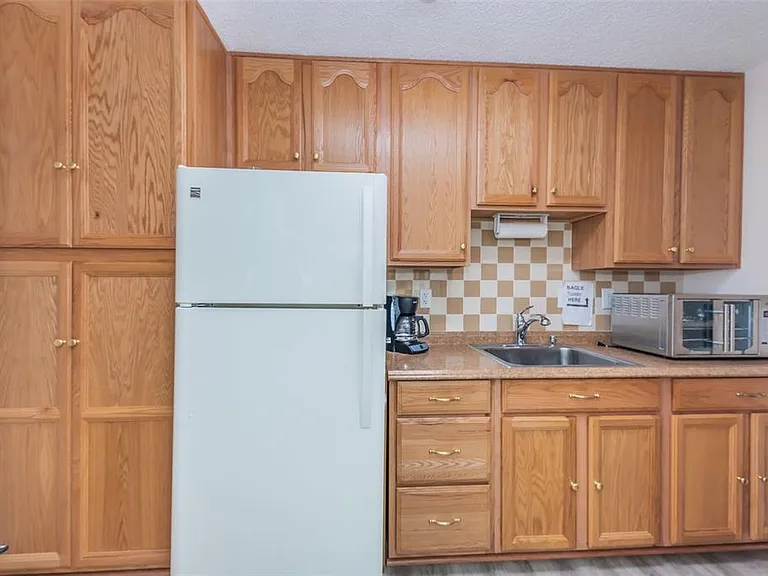 2575 Pine Ridge Way S #E1 — Photo 21