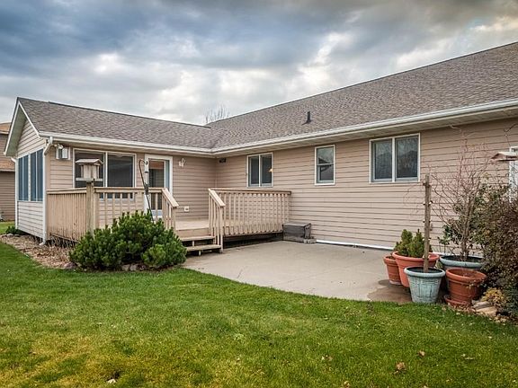 Access the deck and patio from sun porch.