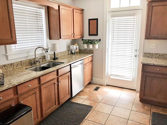 Kitchen with access to back yard