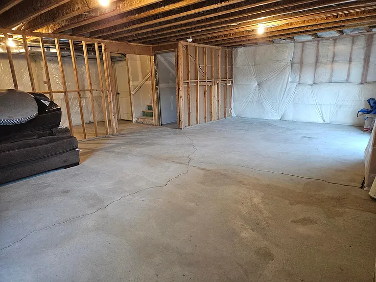 Unfinished basement full of possibilities. Use it as an additional family room, play room, home gym or just storage. Whatever you need, this bright daylight basement is full of possibilities and walks out into back yard.