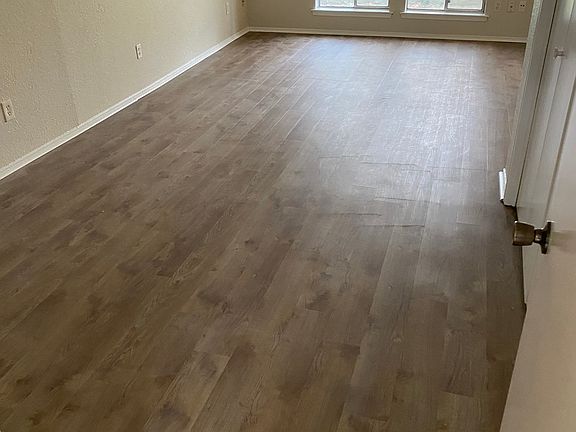 Master bedroom w/built in desk front left out of picture. Pic appears smaller than actual