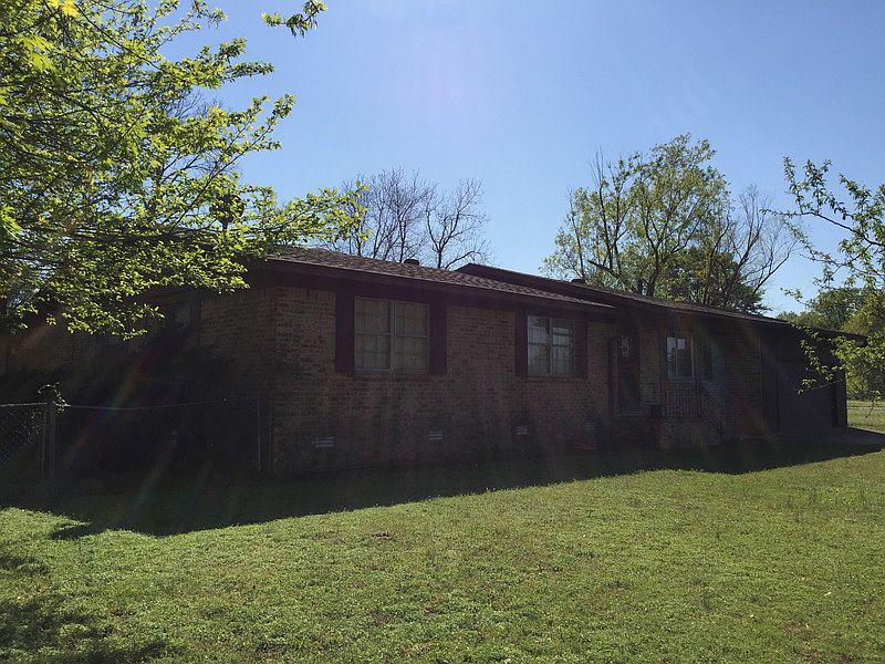 This homestead with 3.50 acres of beautiful park like setting