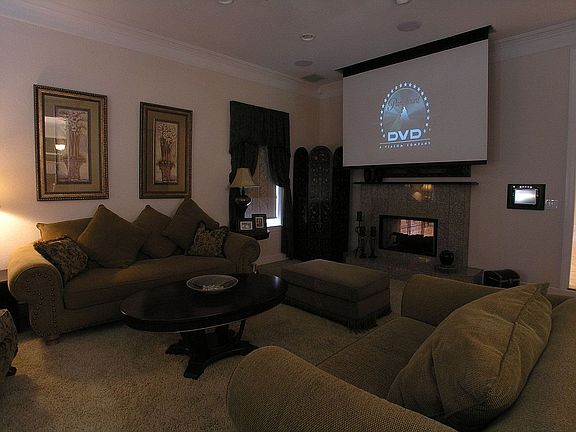 Living Room features Media set up with projection TV