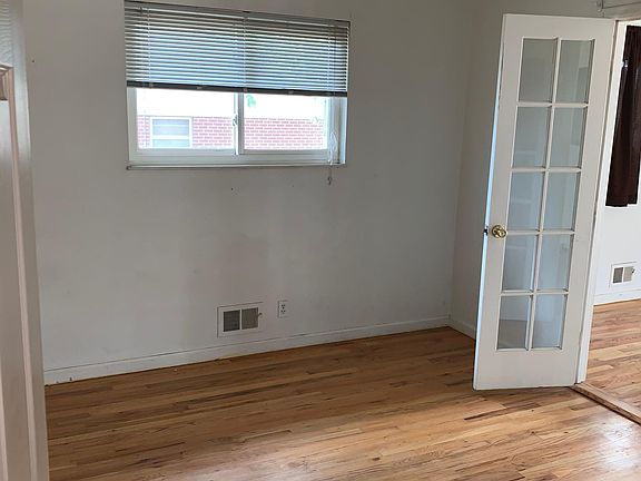 3rd bedroom/den area closet and regular door plus two french doors