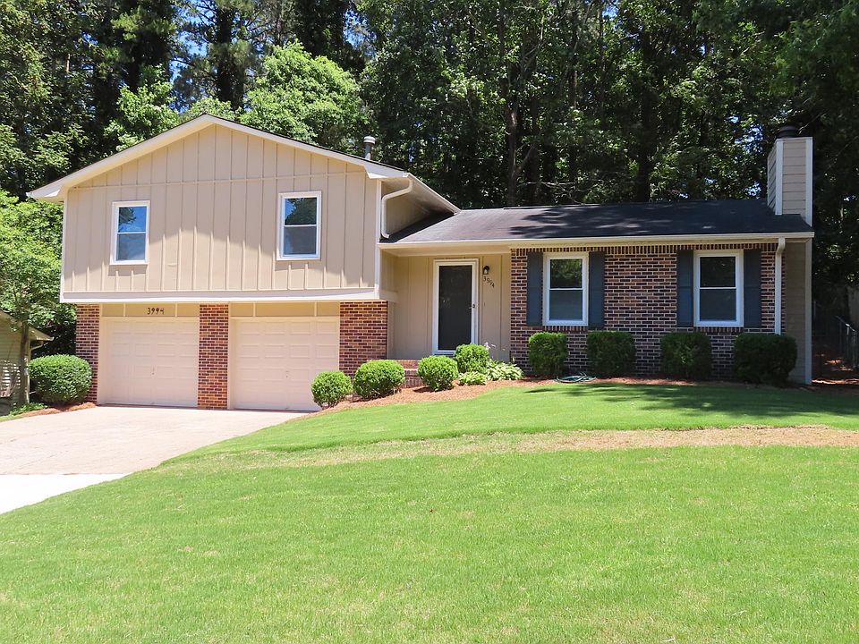 Split Foyer, 2-car Garage with up-dated landscape.