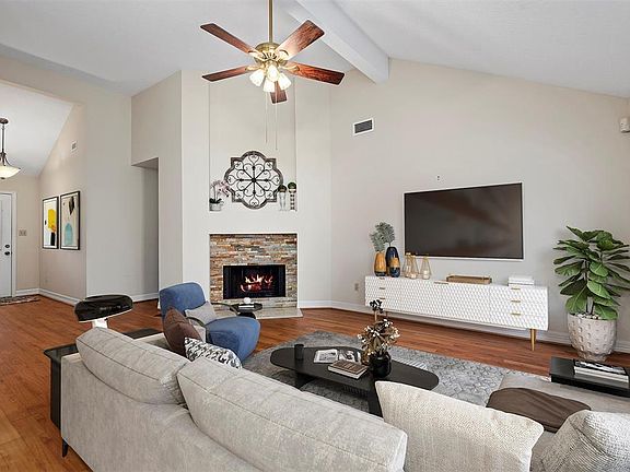 Lots of options for seating arrangements with this large living area. (virtually staged)