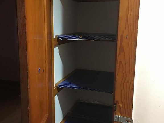 Hall closet, next to bathroom