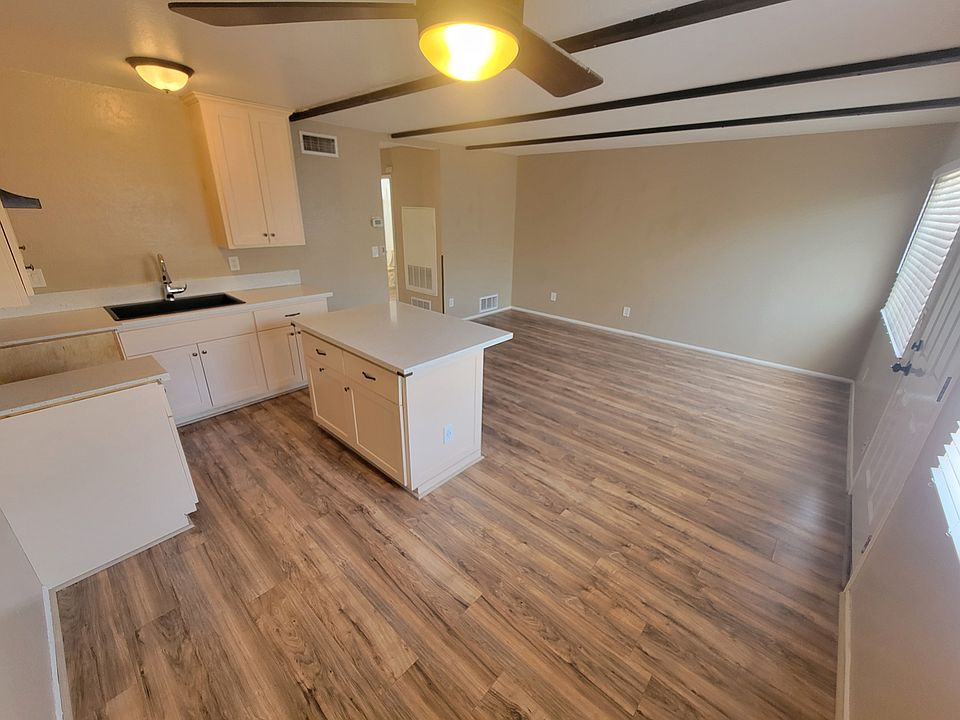 Dining area has ceiling fan. above