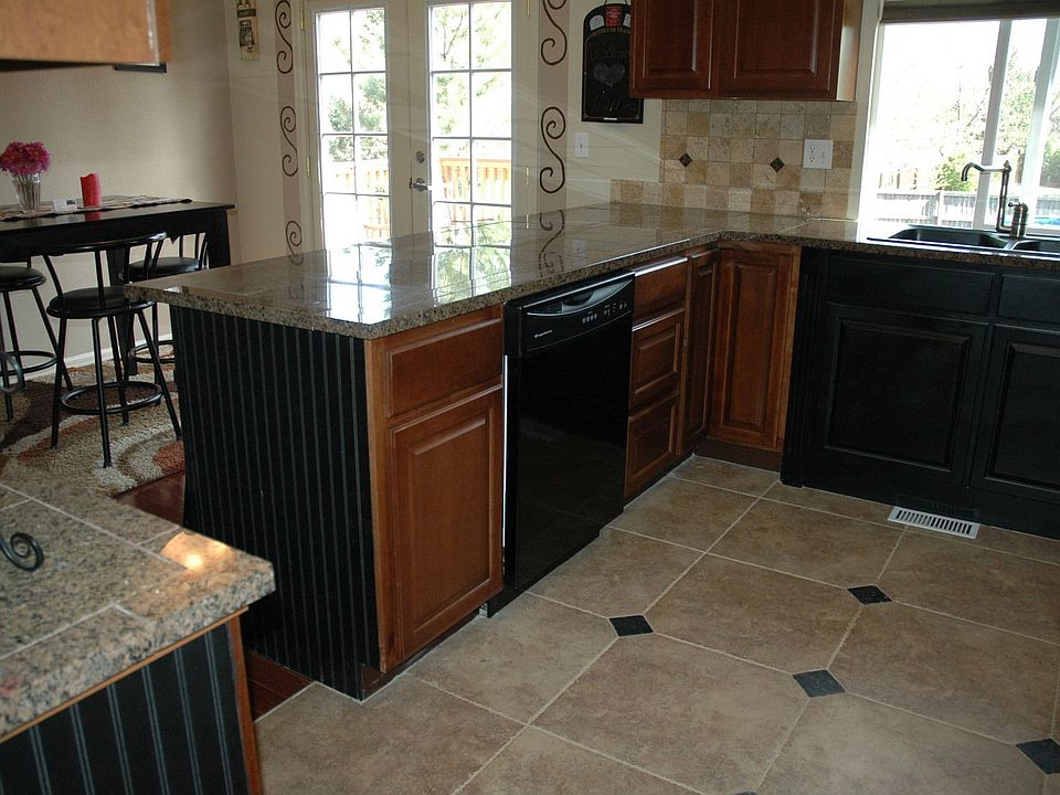 Custom Maple Cabinets with Crown Molding Solid Granite, New Dishwasher & Marbl