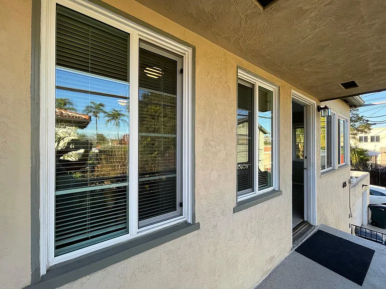 Front entry on second floor balcony.