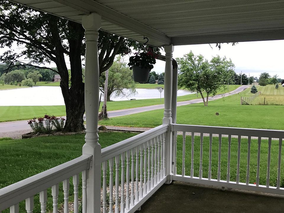 Front porch with relaxing view of lake.
