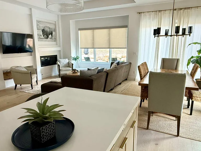 Living room with gas fireplace and smart tv