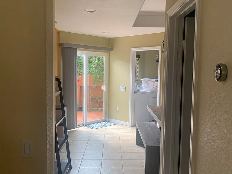 Hallway from Living Room to Half Bath/Dining Area/Kitchen