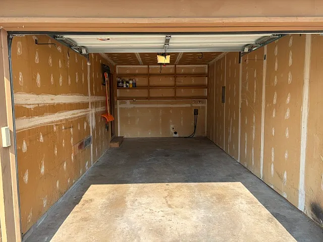 Garage, with shelves and washer/dryer hookups