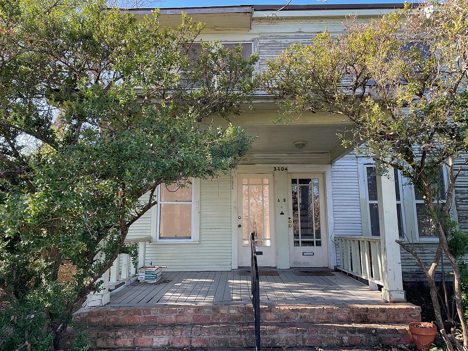Front of the house. Unit 1 duplex door on the left.