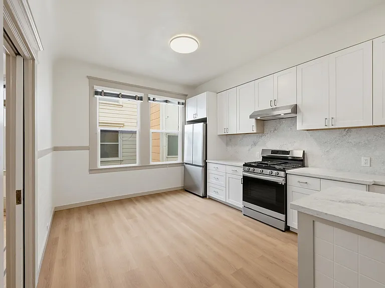 Large and updated kitchen with peninsula and room for an eat-in kitchen table