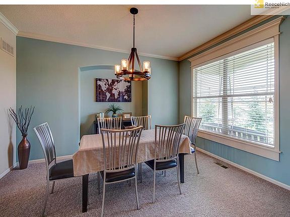 LOVELY FORMAL DINING AREA WITH  PLENTY OF SPACE FOR FAMILY GATHERINGS