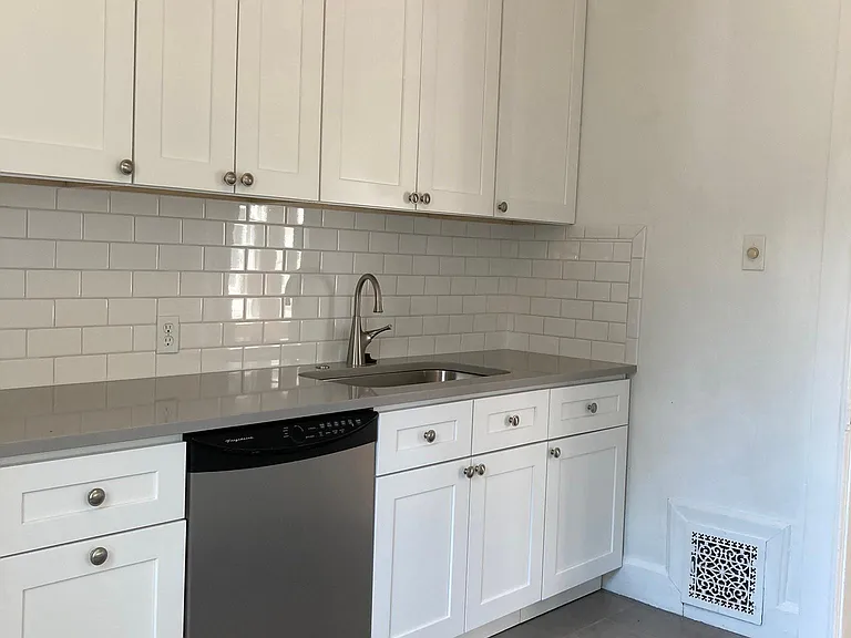Custom cabinets. Soft close. Built in trash and recycling. Full size cabinets for storage. New dishwasher and garbage disposal. Beautiful outdoor space.