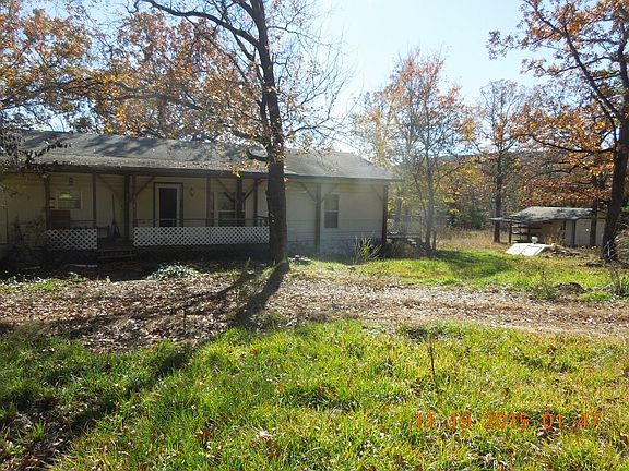 Front with Garage/Shop