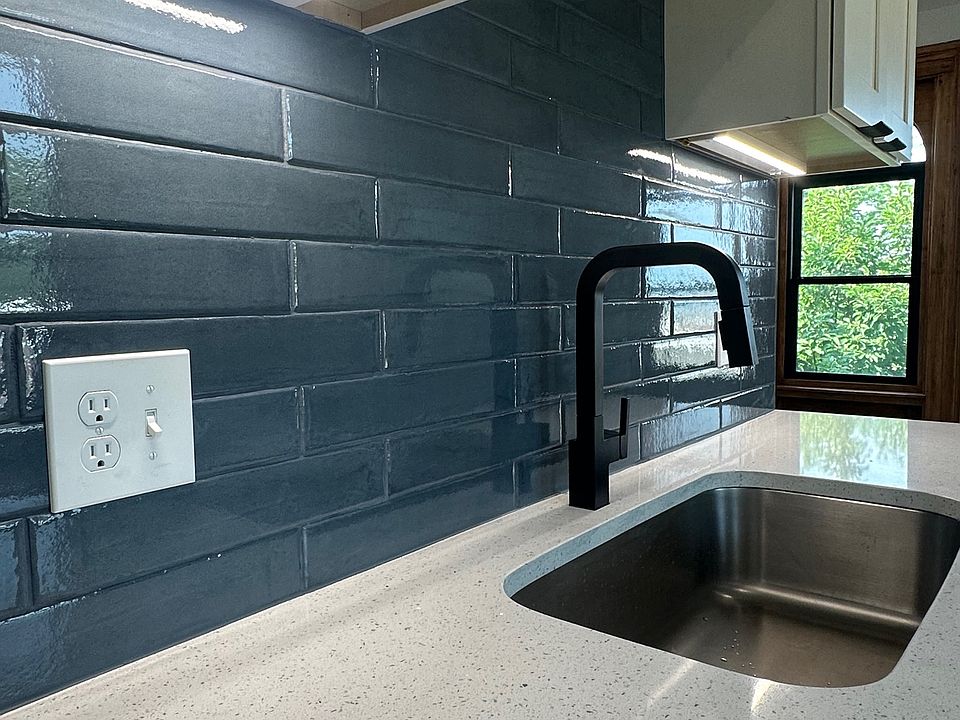 Quartz countertops; Tile backsplash