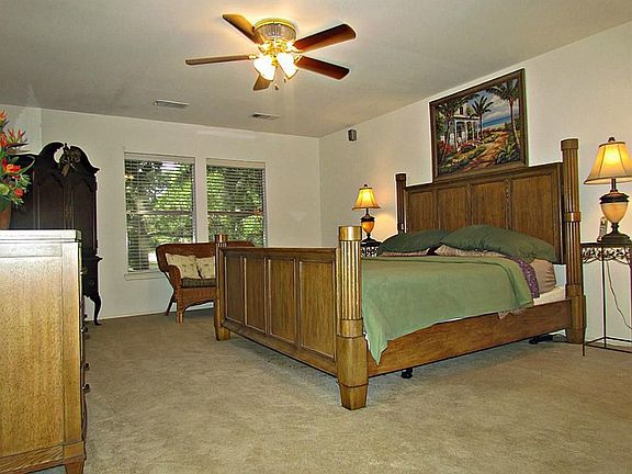 Here is a great view of your master bedroom that over looks the back yard.