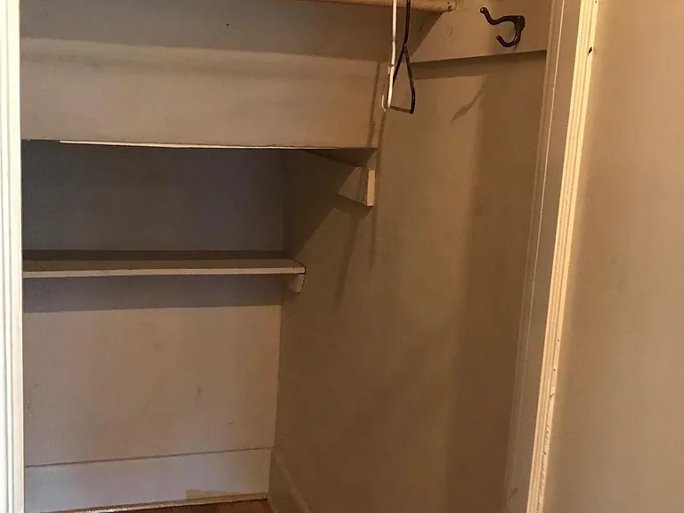 UNDER STAIR FRONT HALL CLOSET