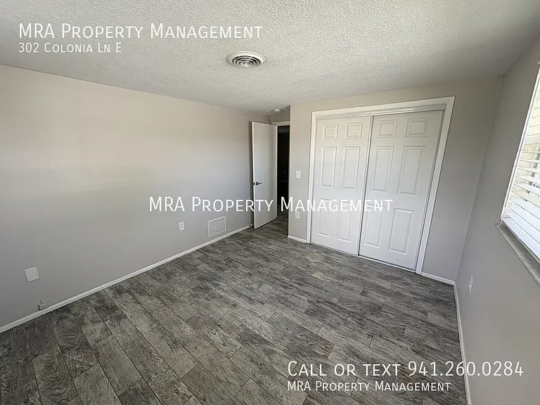 302 Colonia Ln E — Photo 9
